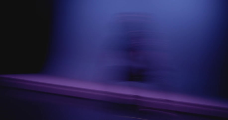 A woman is dancing on the stage