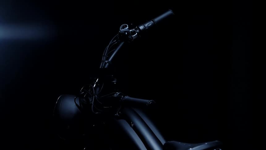 A bicycle is parked in the garage