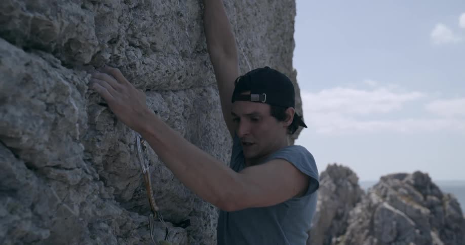 A man is mountain climbing
