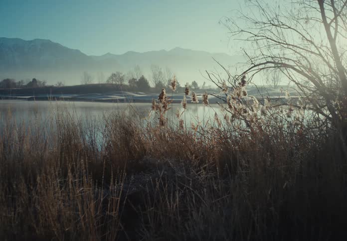 A lake is by the mountains