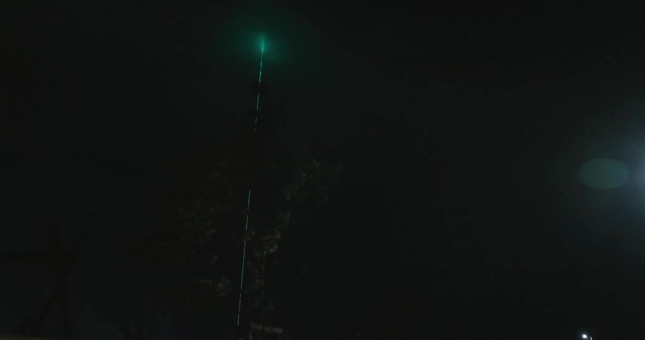 Green Laser in the city at night