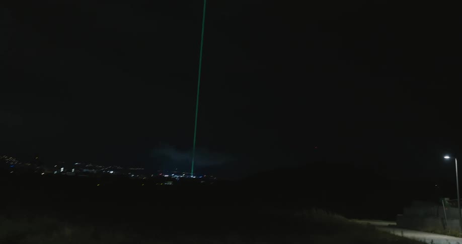 Green Laser is shining high into the sky