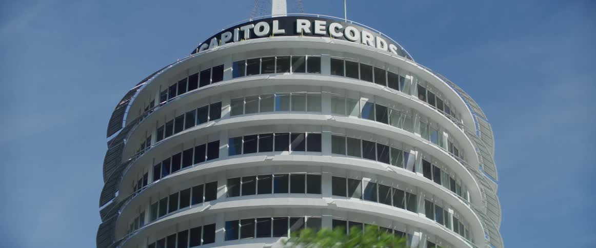 The capitol records building on a roadway
