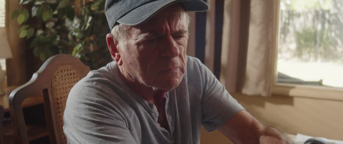 Elderly man working from home