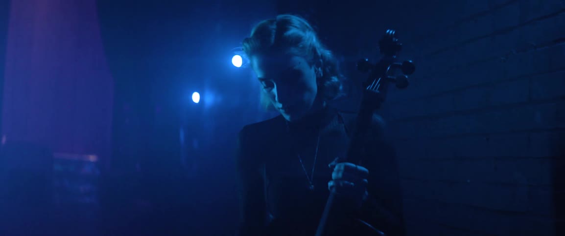 Musician nervously paces backstage before a performance