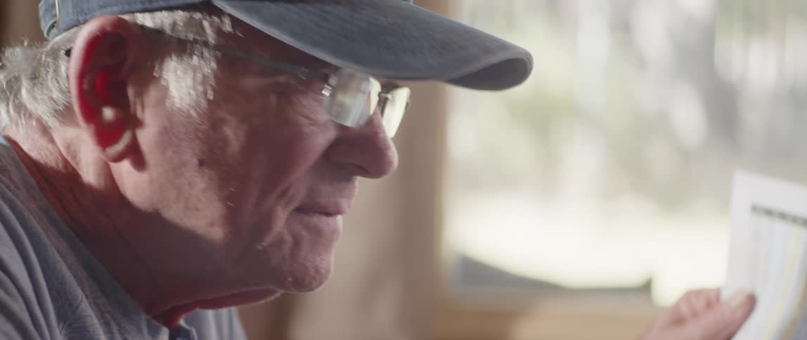 Elderly man working from home