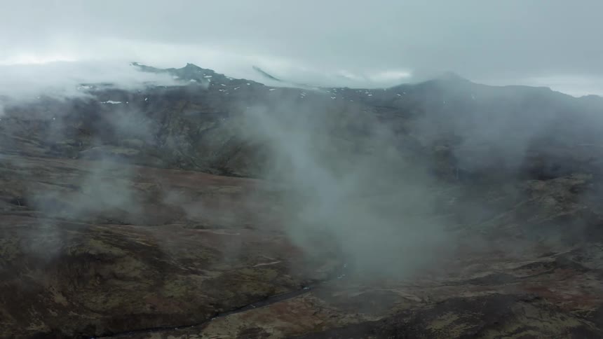 Fog rolls over the mountains