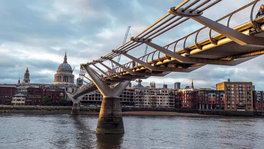Time lapse of tourists crossing the millenium bridge in london