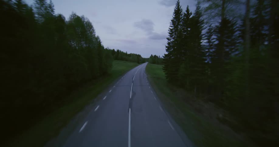 Aerial view of a road through the countryside at morning