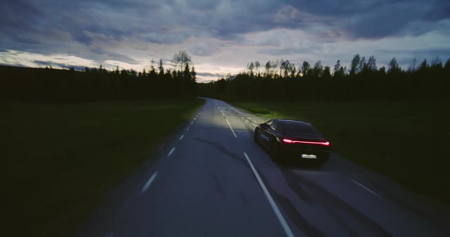 The car is driving through the highway