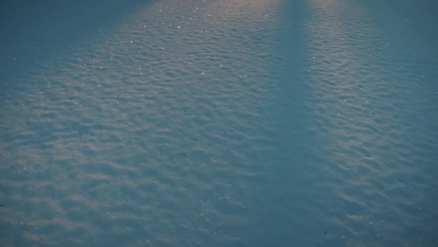 Icy ground at sunset