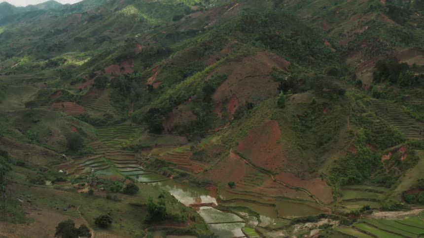 An aerial clip of a farm mountain