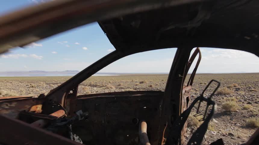 Abandoned vehicle in the desert