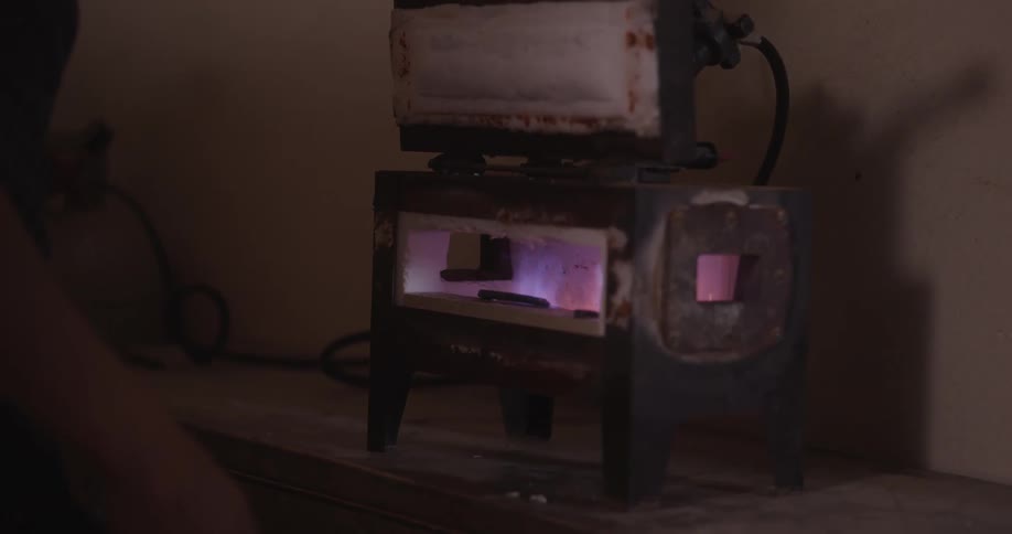 Blacksmith starts a small gas forge