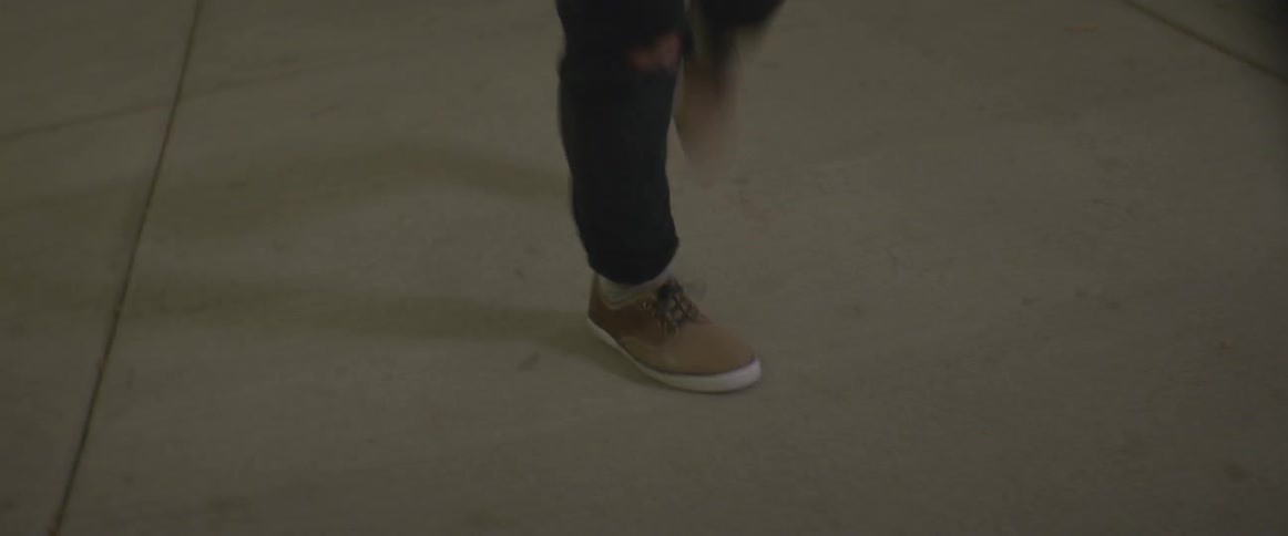 A person's feet are dancing fast on the ground
