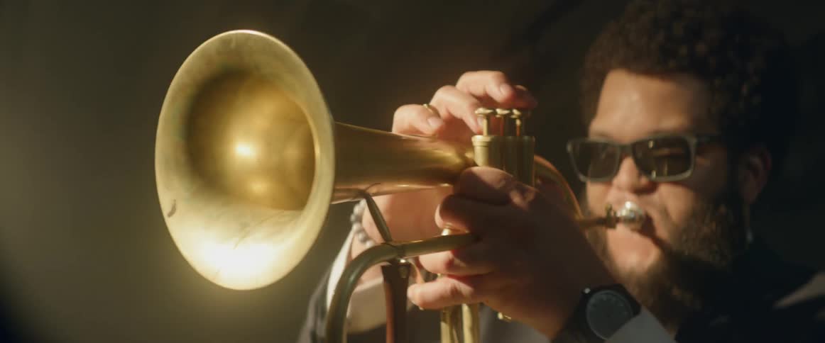 A trumpeter plays his instrument