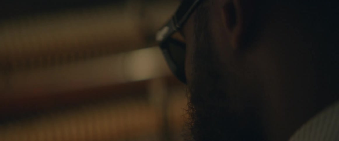 Close up of a man playing the piano