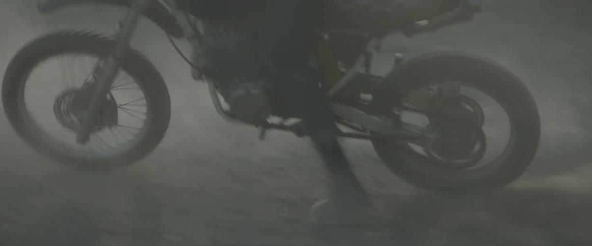 Person spinning around on a dirt bike