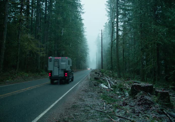 A clip of a freeway in the woods