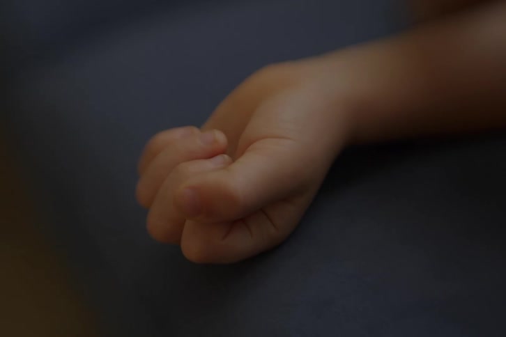 Close up of the hand of a baby