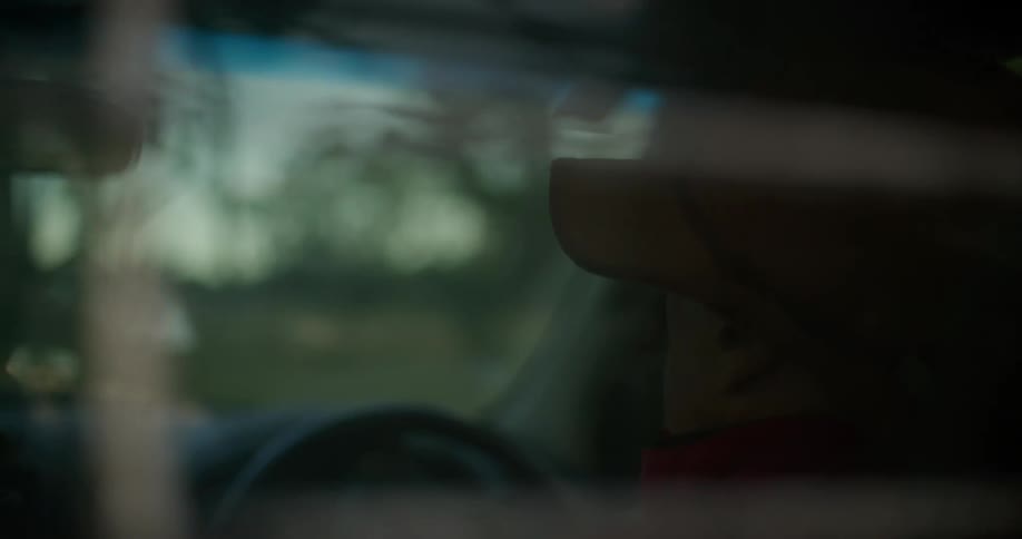 A man is driving the car