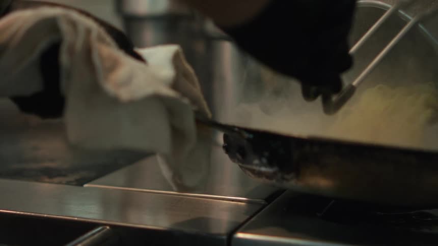 A clip of a chef preparing noodles