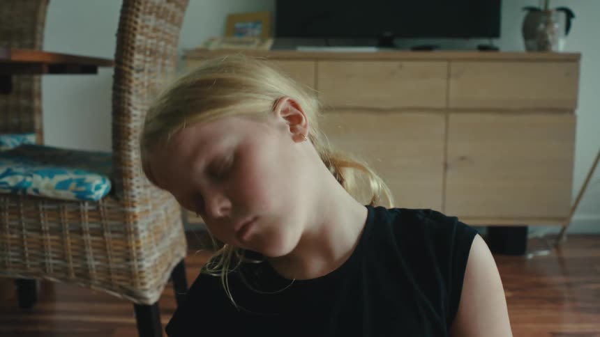 A girl is stretching her neck