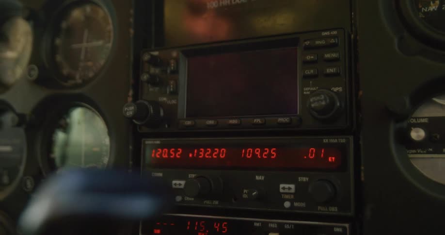 Close up of electronics on the dashboard of an airplane