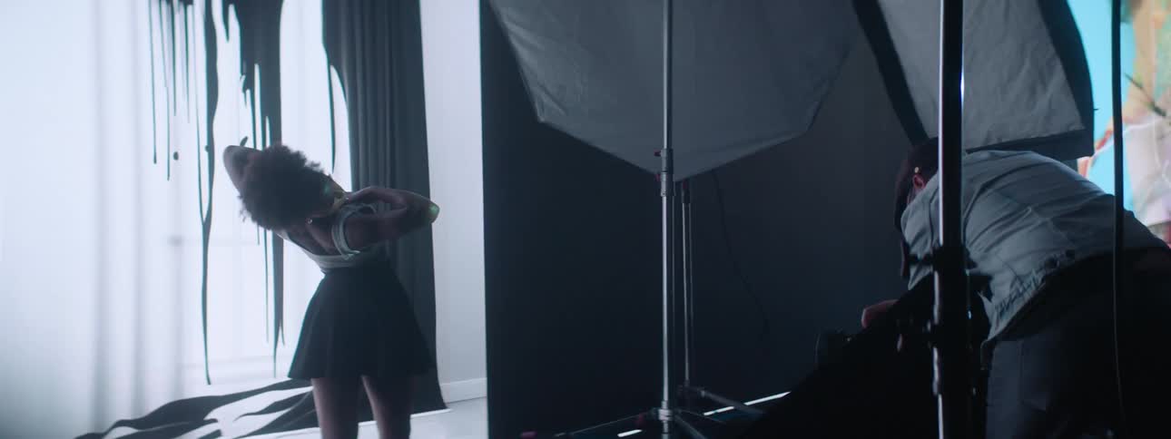 A female posing of photography shots in the studio