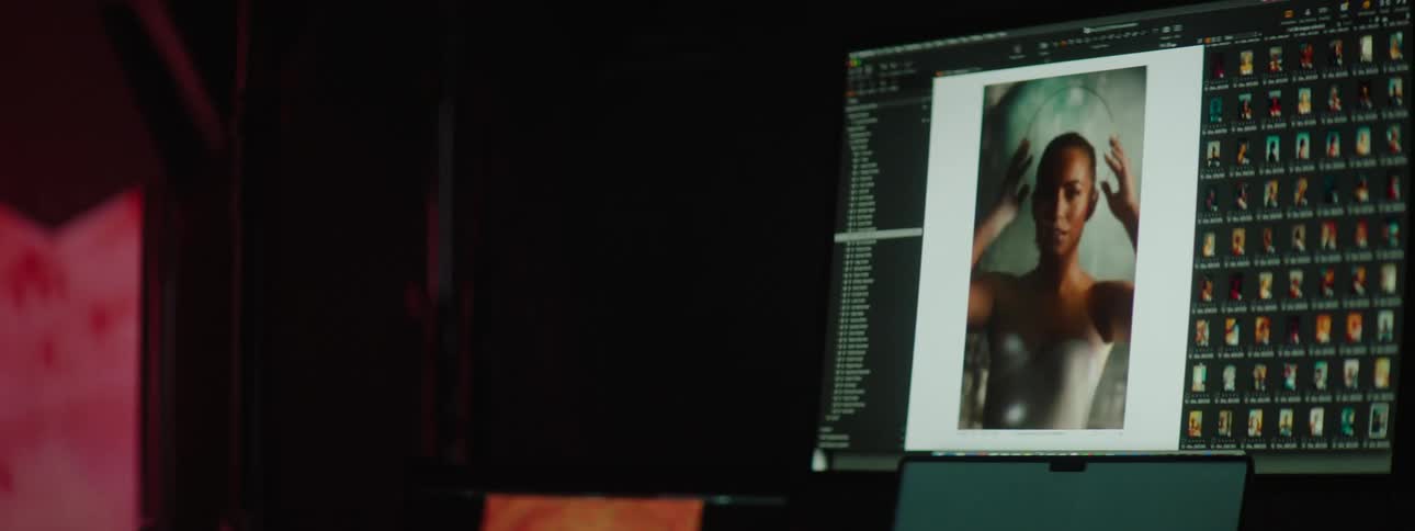 Images of a woman flash on the computer screen
