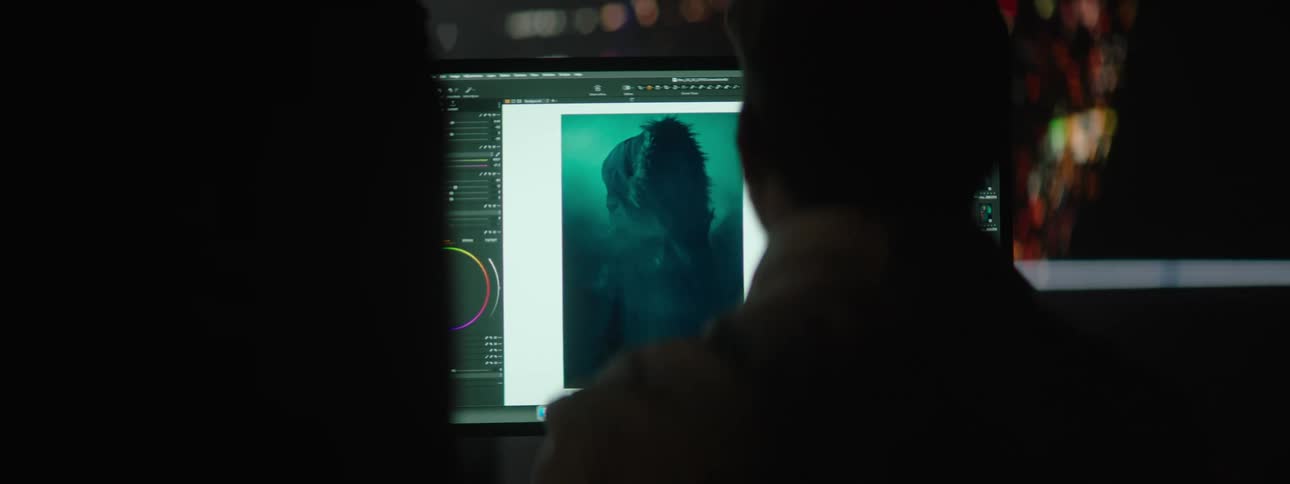 A man is using the computer