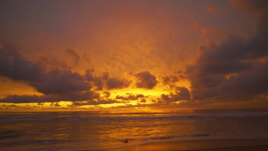 Golden yellow sunset over the coast