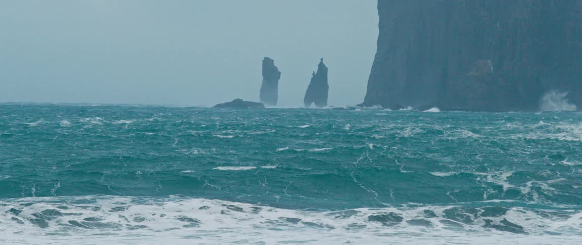 The ocean is rough around the shore