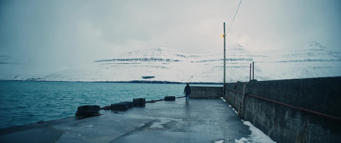 Woman walks along a promenade