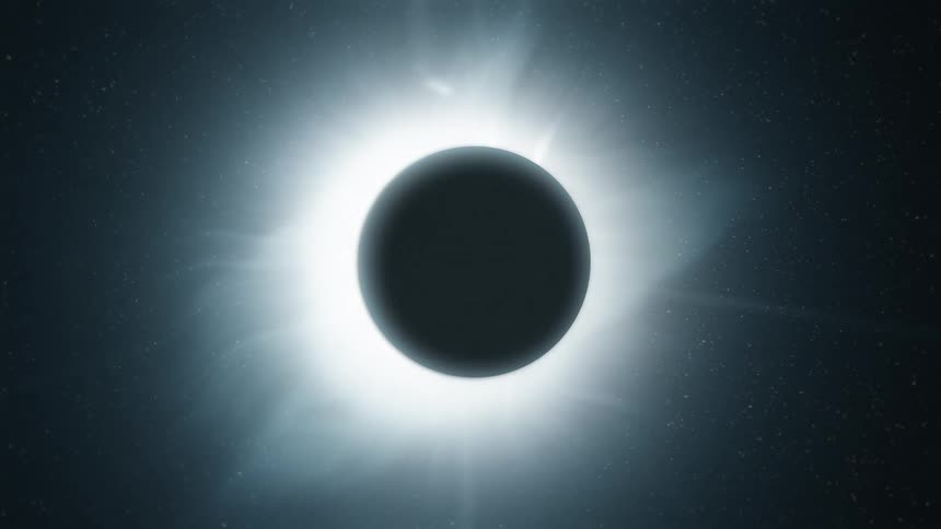 The moon is dark and entering in front of the sun causing an eclipse