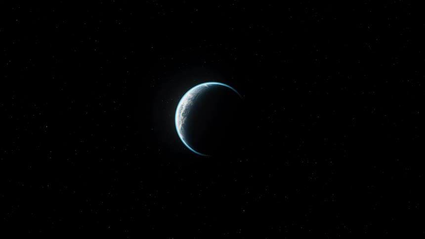 The planet earth seen from space is spinning and is completely in the dark