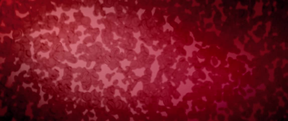 Liquid art with red particles in water