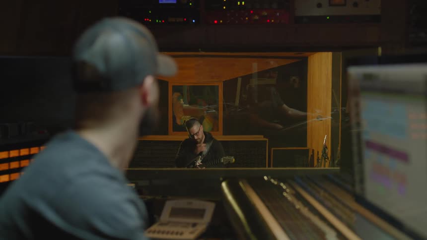 Friends composing songs in a studio