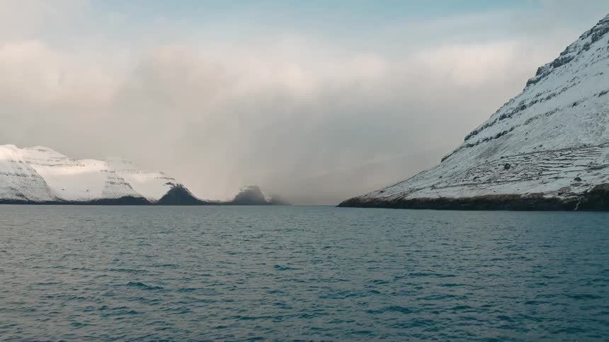 The mountains are surrounded by water