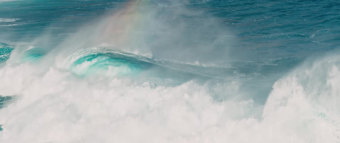 Big ocean waves with white water sea spray