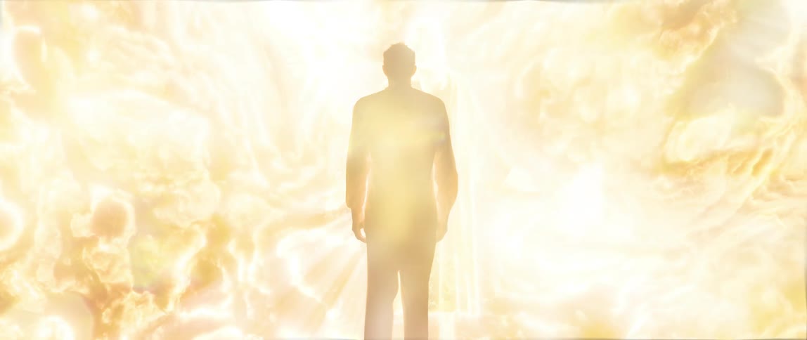 Clouds and light cover the man