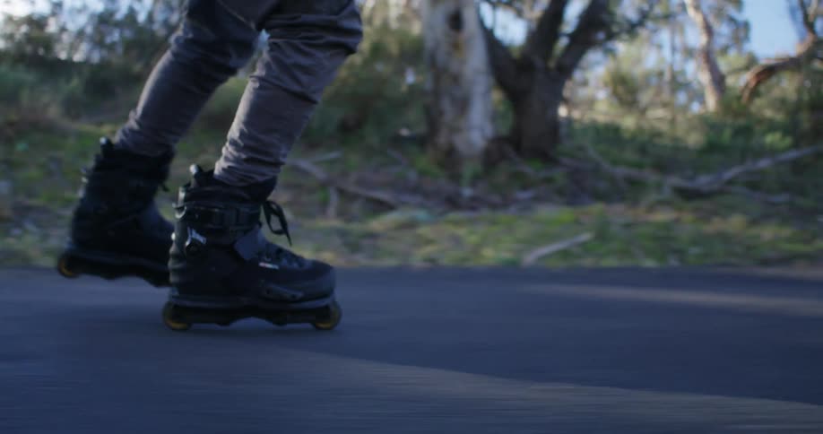 A person is rollerblading on a path