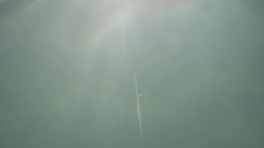Underwater bubbles ripples and sun flares