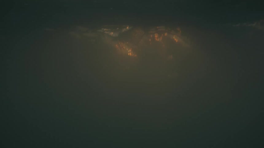 The sun sets over the ocean