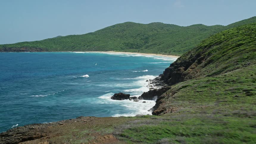 Aerial panorama of a beach with turquoise blue sea