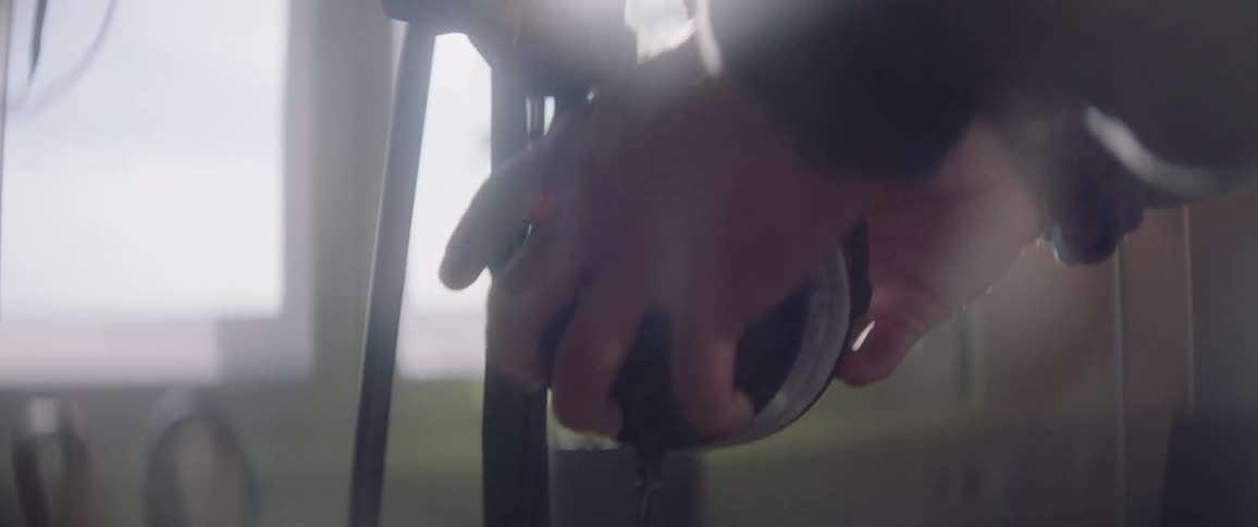 Closeup of a persons hands holding headphones