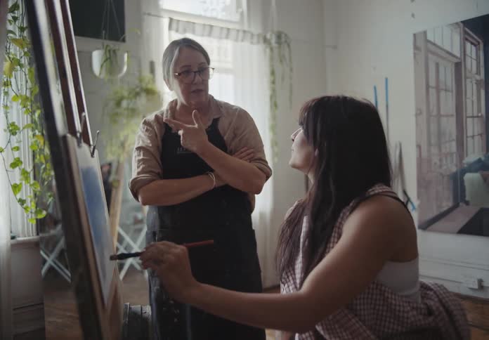 A clip of painters having a conversation