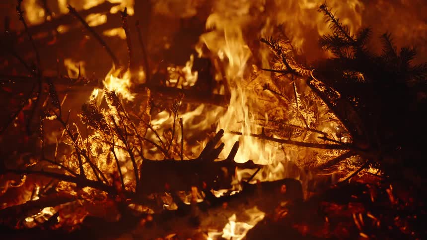 The fire is burning at night