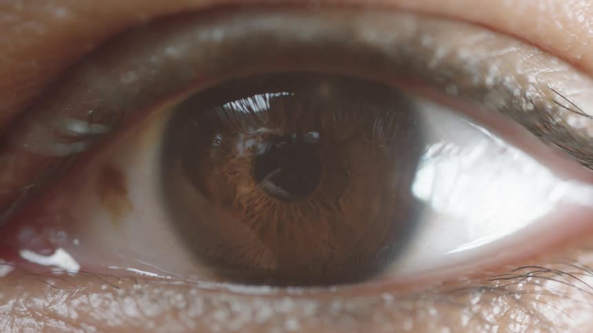 A person blinks their eye