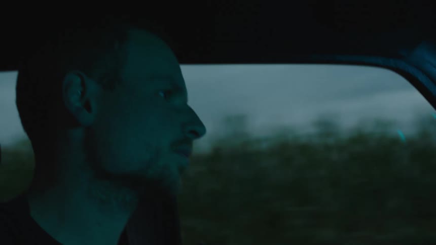 A man driving at night
